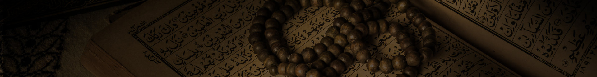 prayer beads on holy book of muslims